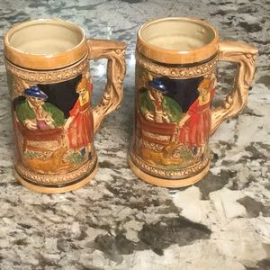 Set of 2 vintage identical hand painted beer steins German style